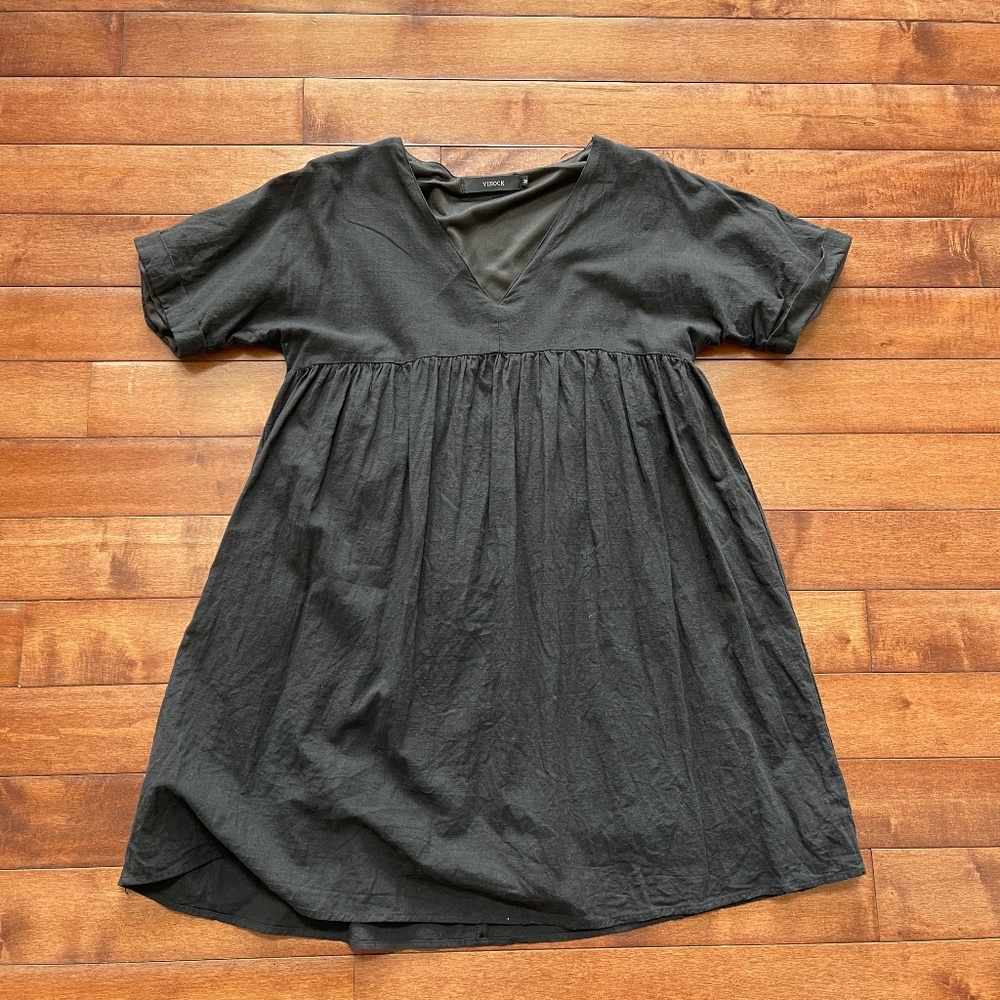 Yibock Black V-Neck Ruffled Blouse, size medium